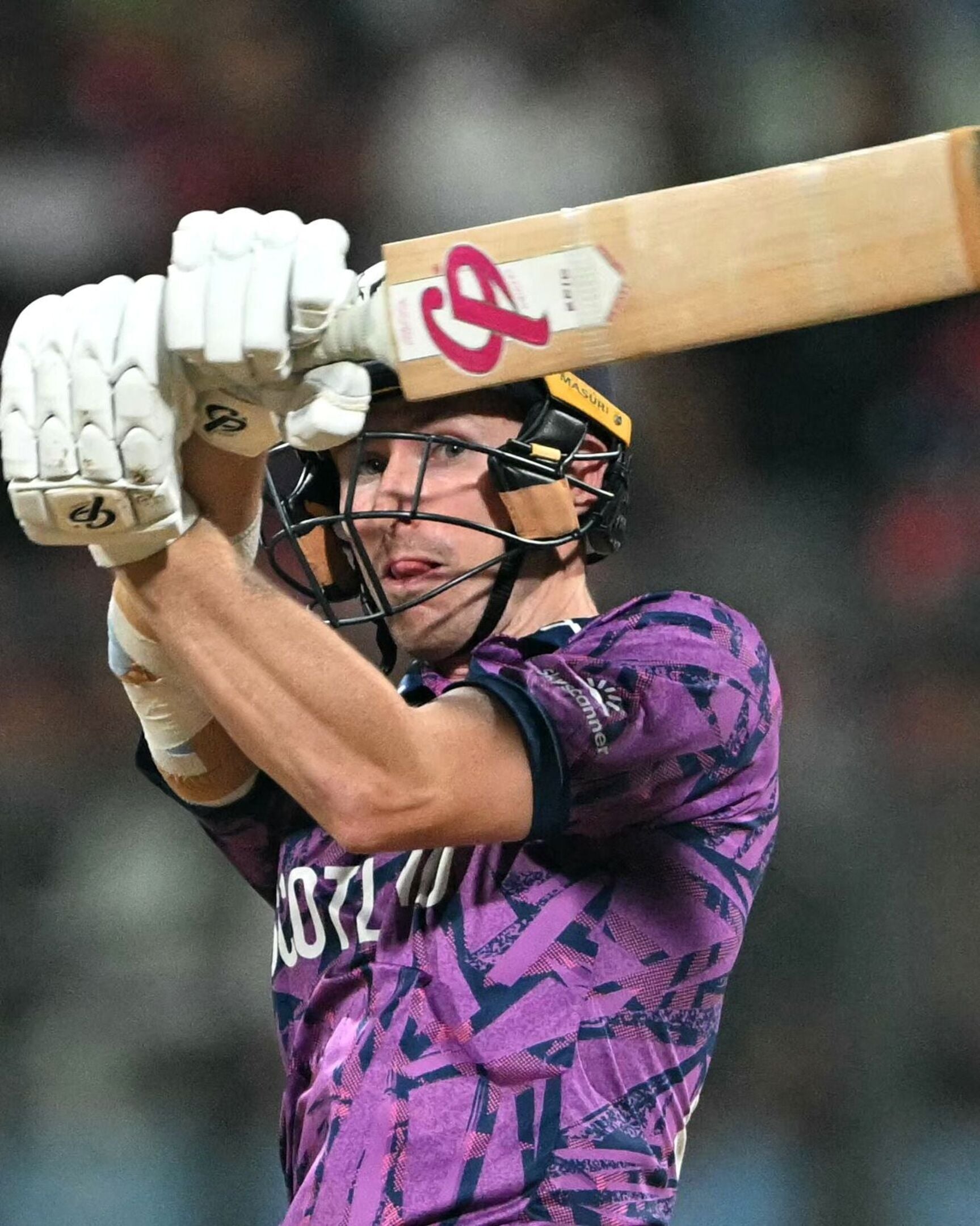 Scotland's Brandon McMullen plays a shot during the 2026 ICC Men's T20 Cricket World Cup group stage match between Nepal and Scotland at the Wankhede Stadium in Mumbai on February 17, 2026. (Photo by Punit PARANJPE / AFP)